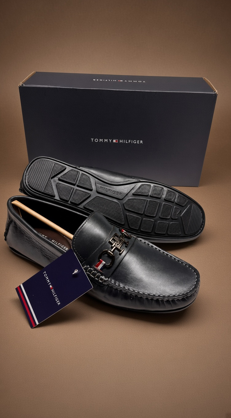 TOMMY HILFIGER Men's Executive  Smooth Leather Slip-On Loafers with Metallic Hardware & Ribbon Detail