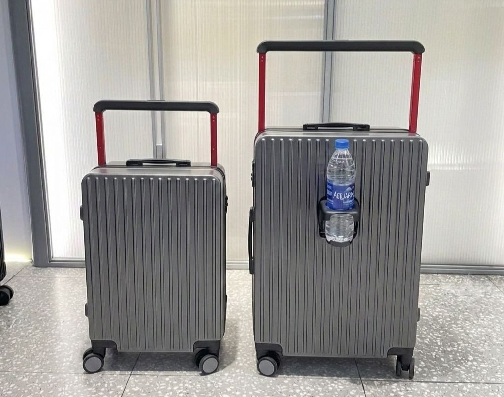 Modern Metallic Grey Hard Shell Travel Trolley Suitcase Set with Foldable Cup Holder & Contrast Red Wide Telescopic Handle