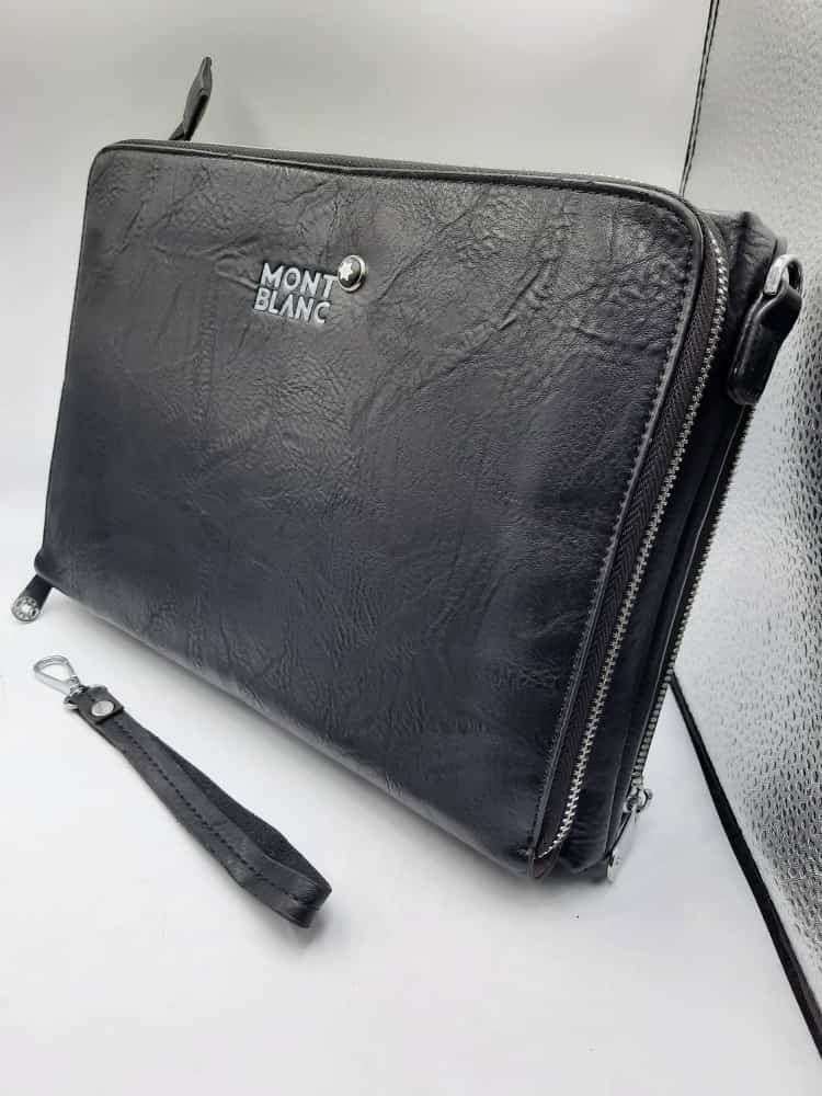 Stylish Black PU Leather Sling Bag / Shoulder Bag with Flap Cover, Timberland Logo, and Wristlet Strap